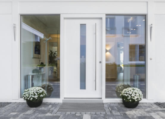 uPVC front door with frosted glass and side panels