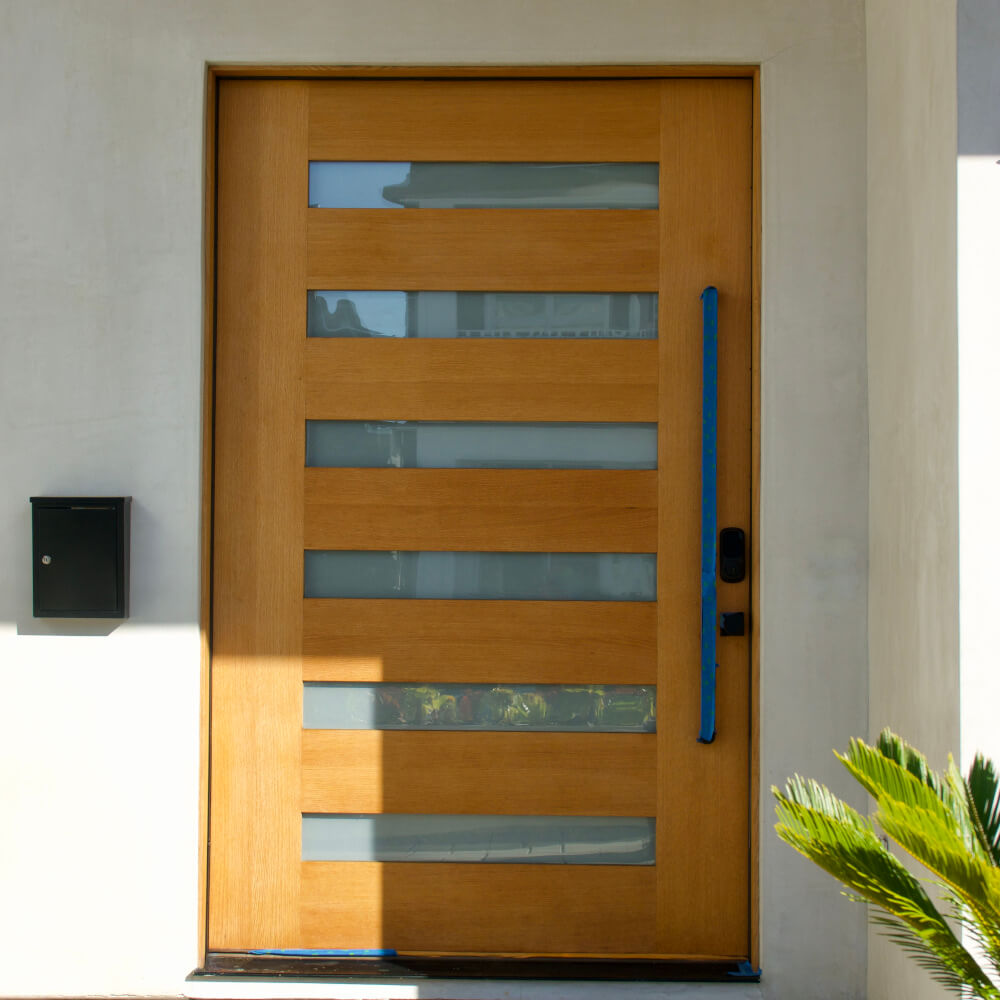 Wood front door with glass panel