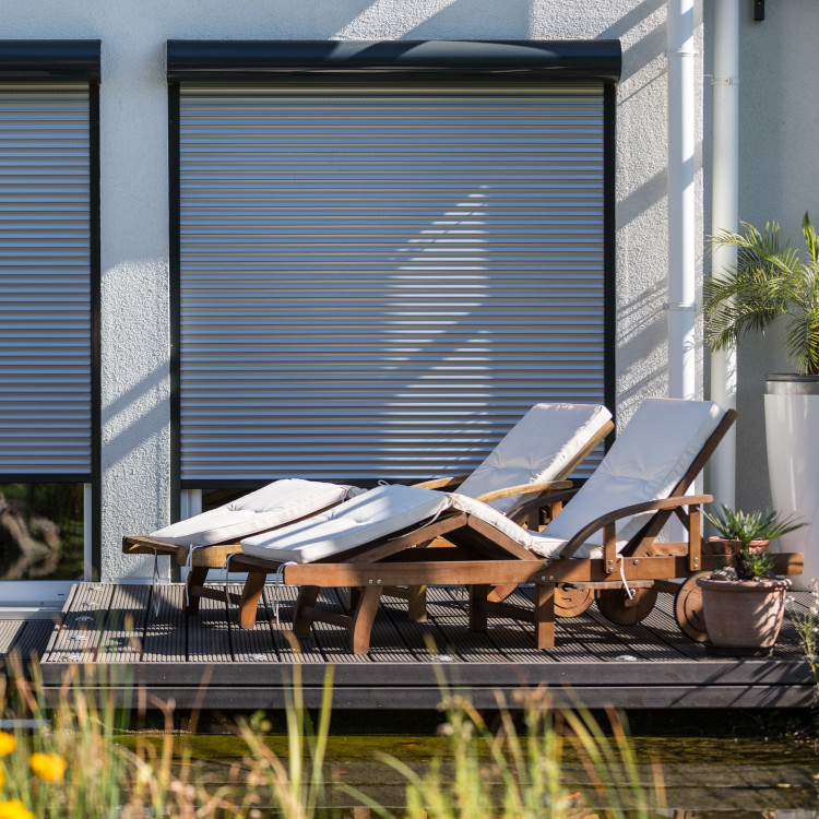 Front-mounted patio door roller shutters