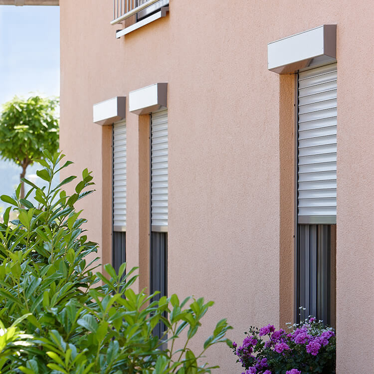 Front mounted roller shutter fitting position