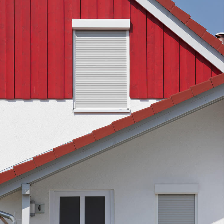 Front mounted roller shutter in its fitting position