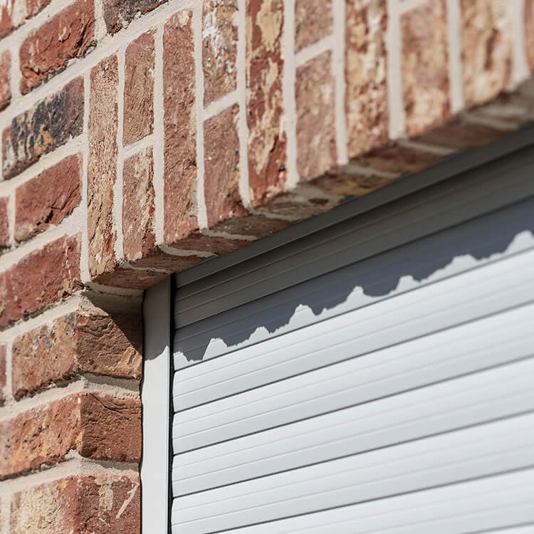 Roller shutters as a detailed view with the wall