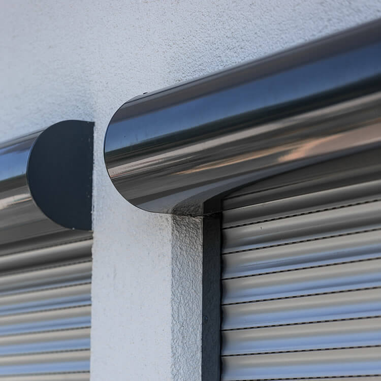 Round front mounted roller shutter system in detail