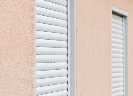 Top-mounted uPVC roller shutters