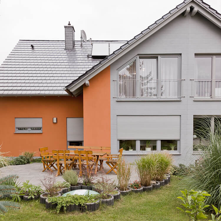 Top mount roller shutter single family home