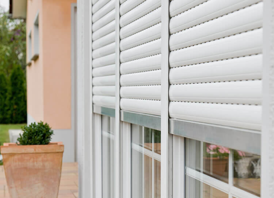 Windows with shutters and bars