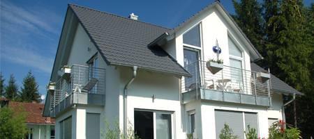 Dormer with trapezoid window