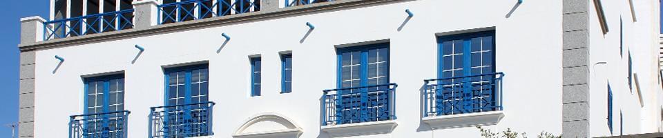 Soil-level blue transom window