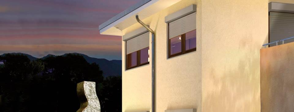 Window with front-mounted roller shutter
